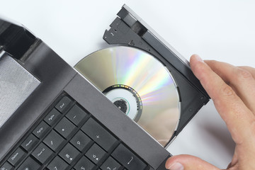 insert disk into laptop