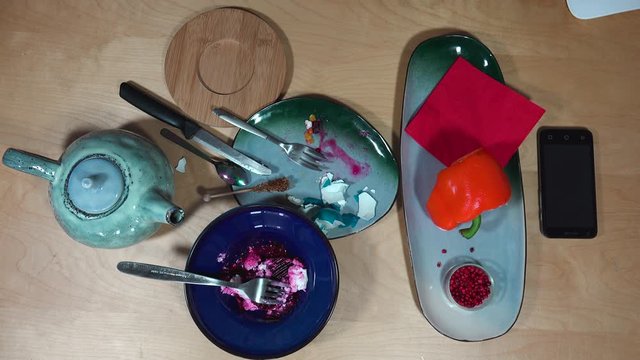 Top view with breakfast, tea, egg, salad and smartphone.