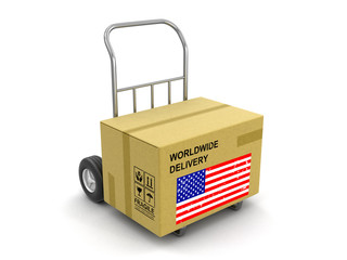 Cardboard Box on Hand Truck with USA flag. Image with clipping path