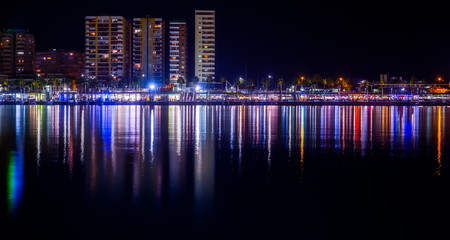 Fototapeta na wymiar Malaga city harbor at night, Spain