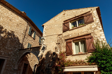 Fototapeta na wymiar bottom view of ancient stone buildings at old european town, Antibes, France