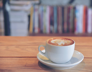 Coffee cup on the table in coffee shop.