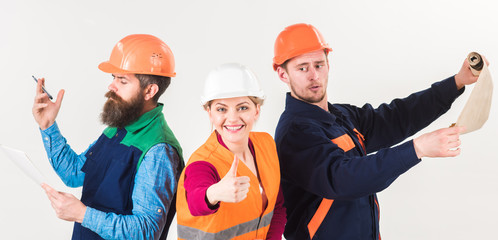Men and woman in helmets busy with different tasks white