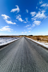 snowy winter road covered in deep snow