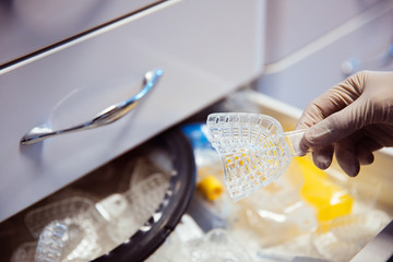 Manufacture of molds for dentures in laboratory