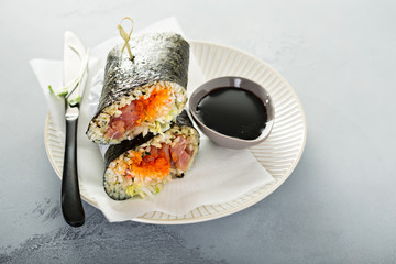 Sushi or poke burrito with nori