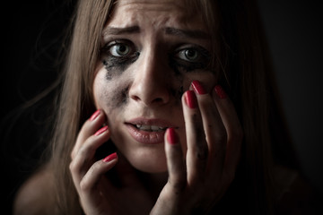 Depressed crying girl. Closeup