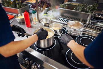 staff prepare dishes