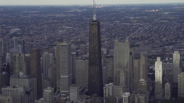 Chicago morning aerial view slowly moving towards John Hancock Center featuring 900 North Michigan and the Ritz Carlton Hotel