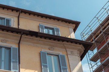 Fototapeta na wymiar Buildings Architecture in Rome Italy blue sky summer