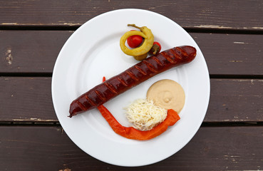 Close up portion of smoked grilled sausage