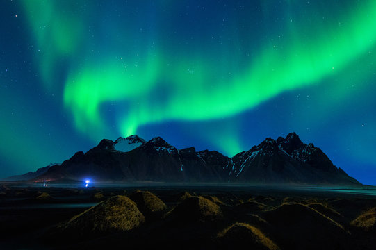 Northern Light, Aurora borealis at Vestrahorn mountains in Stokksnes, Iceland.