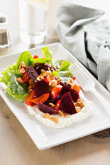 Gourmet beet salad with cheese and lettuce