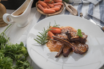 lamb steak on white plate