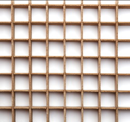 Grid from cardboard background. Wood lattice pattern.