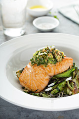 Grilled salmon on the bed of sauteed greens