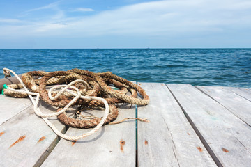 Perspective of wood terrace against beautiful seascape