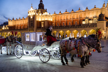Fototapeta Horse carriage at Main square in Krakow, Poland obraz