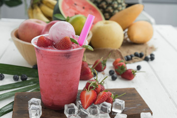 Summer refreshing healthy drink , strawberry smoothie or fresh with mint
