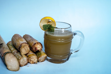 Popular Indian/Asian Ganne ka ras or Sugar cane or Saccharum officinarum juice in a transparent...