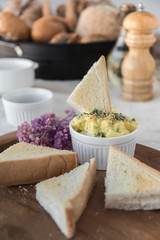 toasts with hard boiled eggs and mustard,