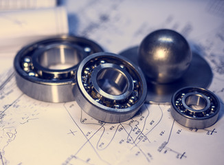 Diameter measurement with calipers, bearings, toned.