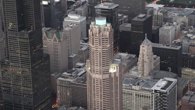 Chicago telephoto aerial view orbiting 311 South Wacker Drive at dusk