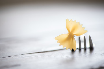 Farfalle pasta on fork