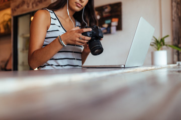 Woman working on laptop computer at home