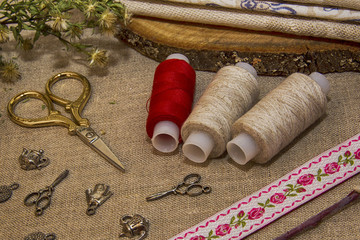 sewing accessories on linen cloth