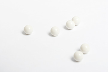 Fototapeta na wymiar airsoft bbs balls on white background