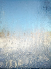 Sunny frozen window. Abstract background.
