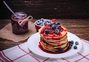 American pancakes with jam and blueberries
