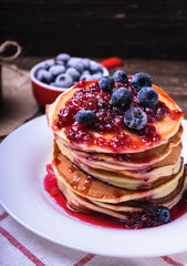 American pancakes with jam and blueberries