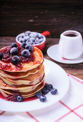 American pancakes with jam and blueberries