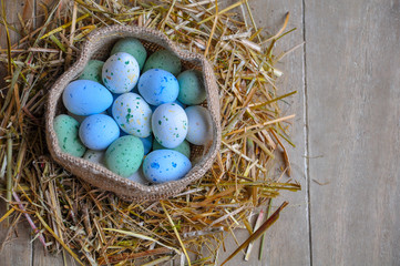 Beautiful Easter eggs on a rice straw 