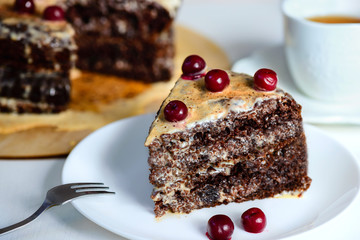 slice of chocolate cake with cherry berries