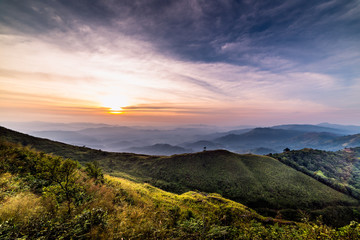 Fototapeta na wymiar High mountains in tropical rainforest Sunset in Thailand
