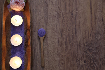 Beautiful composition of spa treatment on white wooden table . spa concept with bath salt .