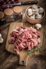 Raw meat diced for stew.