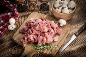 Raw meat diced for stew.
