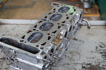 Grinding car head block on the machine. Clean and flat surface.