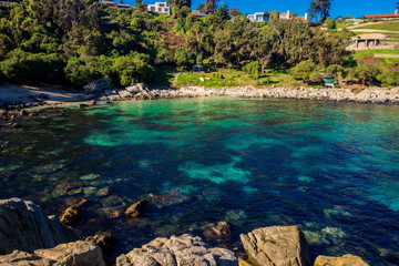 Blue water in beach in Cachagua, near of Zapallar in Chile