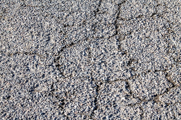 Cracks on the asphalt as background