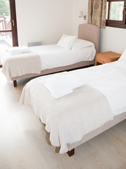 Fototapeta na wymiar Two Single bed room in a modern house