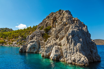Fototapeta na wymiar Rock in the Aegean Sea. Rocky island. Rocky coast. Snake island. Turkey