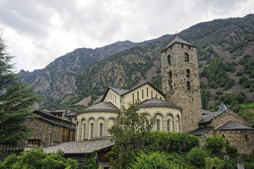 Fototapeta na wymiar Andorral la Vella, Andorra The Chrurch of Sant Esteve facade.External day view of 12th century parish church Esglesia de Sant Esteve on the capital of the Principality of Andorra.