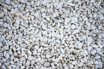 White stone wall texture and background, selective focus