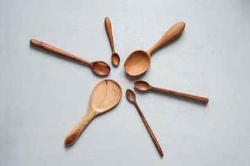 Wooden spoons are handmade in different sizes.