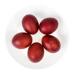 Red painted eggs as symbol of the holiday of Easter